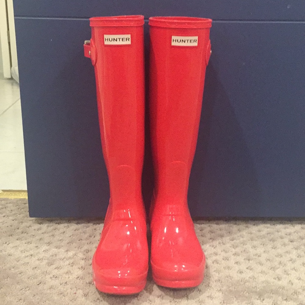 Tall glossy woman’s Hunter boots